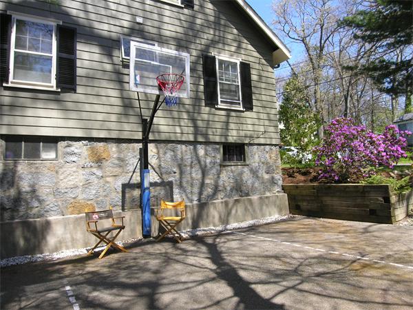 128 Hillcrest Road Needham, MA 02492 - Photo 28 of 28 a front view of a house with a yard