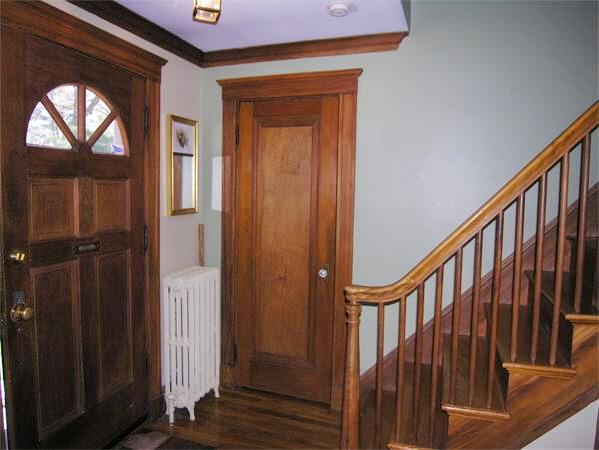 128 Hillcrest Road Needham, MA 02492 - Photo 3 of 28 a view of an entryway with wooden floor and door