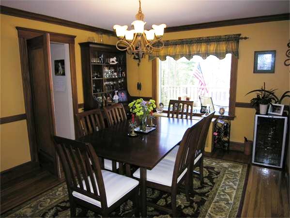 128 Hillcrest Road Needham, MA 02492 - Photo 7 of 28 a view of a dining room with furniture a chandelier and wooden floor
