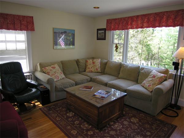 128 Hillcrest Road Needham, MA 02492 - Photo 9 of 28 a living room with furniture and a large window