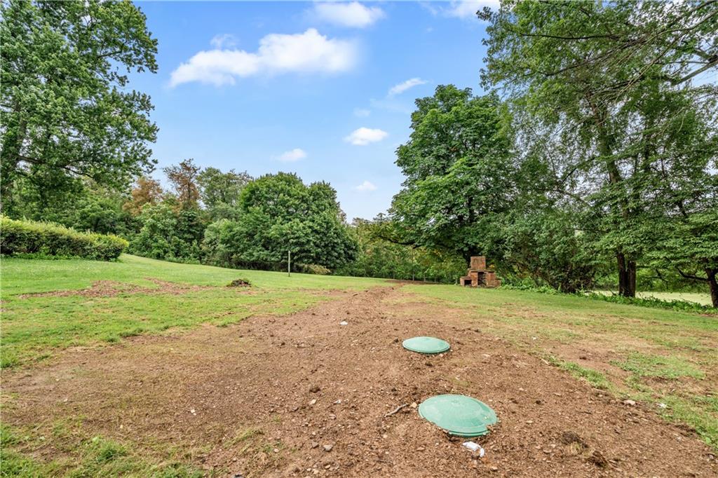 434 Fairview Road Industry, PA 15052 - Photo 27 of 28 Brand new 1,000 gallon dual compartment septic tank with new risers, sewer line and pipe to drainfield.