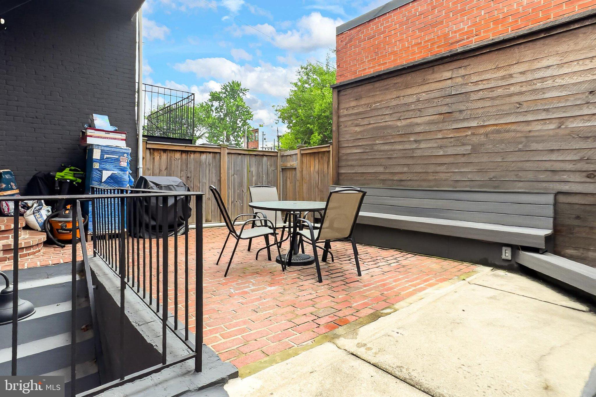 738 11th Street Northeast, Unit 3 Washington, DC 20002 - Photo 28 of 29 Charming outdoor retreat with brick patio.