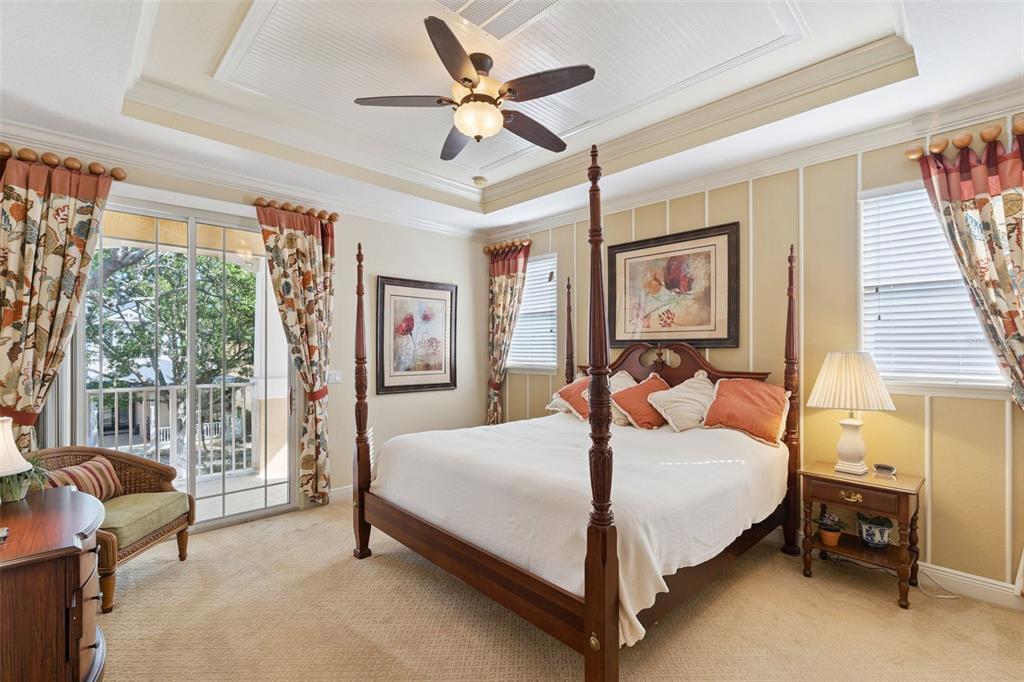 6552 Helmsley Circle Windermere, FL 34786 - Photo 15 of 53 a bedroom with a bed and a large window