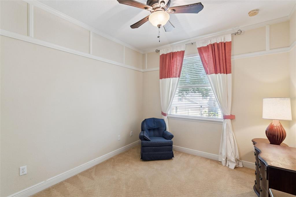 6552 Helmsley Circle Windermere, FL 34786 - Photo 27 of 53 a room with furniture and a window