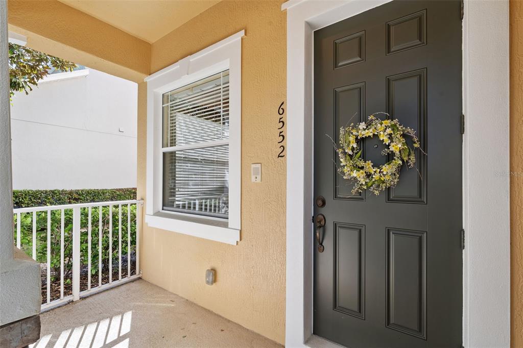 6552 Helmsley Circle Windermere, FL 34786 - Photo 3 of 53 a front view of a house with entryway