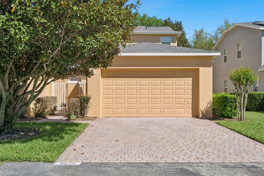 6552 Helmsley Circle Windermere, FL 34786 - Photo 33 of 53 front view of a house with a yard