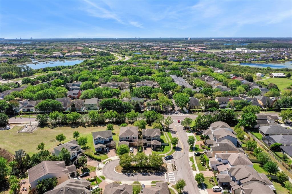 6552 Helmsley Circle Windermere, FL 34786 - Photo 36 of 53 an aerial view of a city with lots of residential buildings