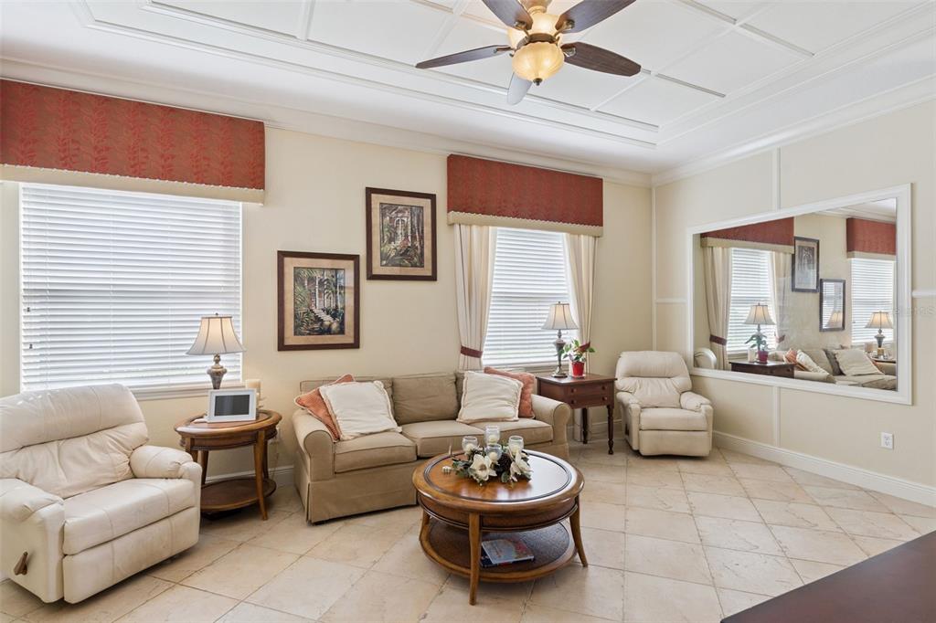 6552 Helmsley Circle Windermere, FL 34786 - Photo 6 of 53 a living room with furniture and a large window