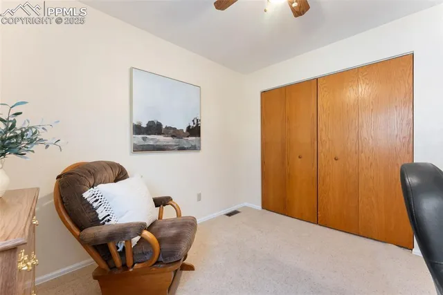 a workspace with furniture and window