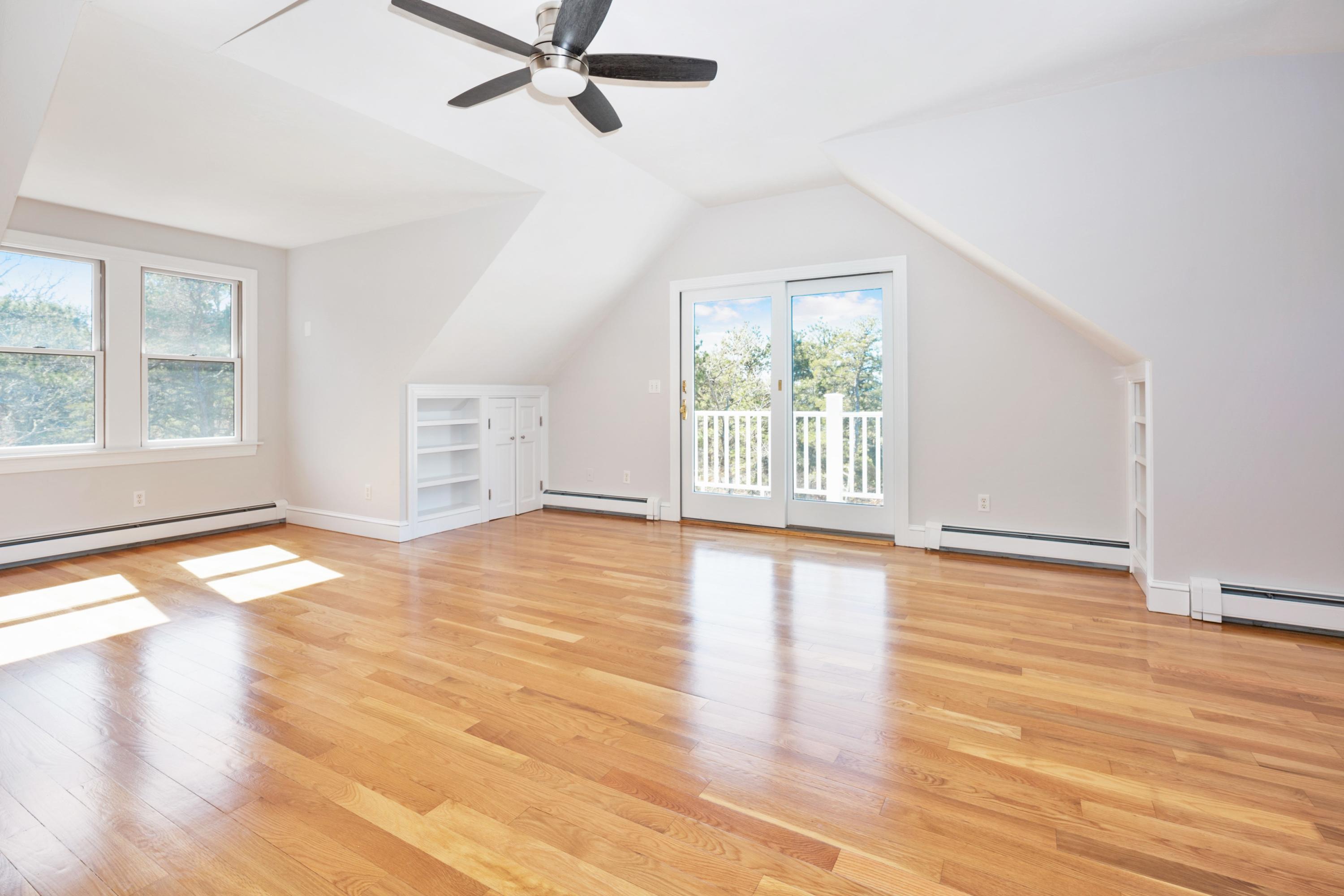 50 Major Doane Road Wellfleet, MA 02667 - Photo 31 of 91 a view of empty room with wooden floor and fan