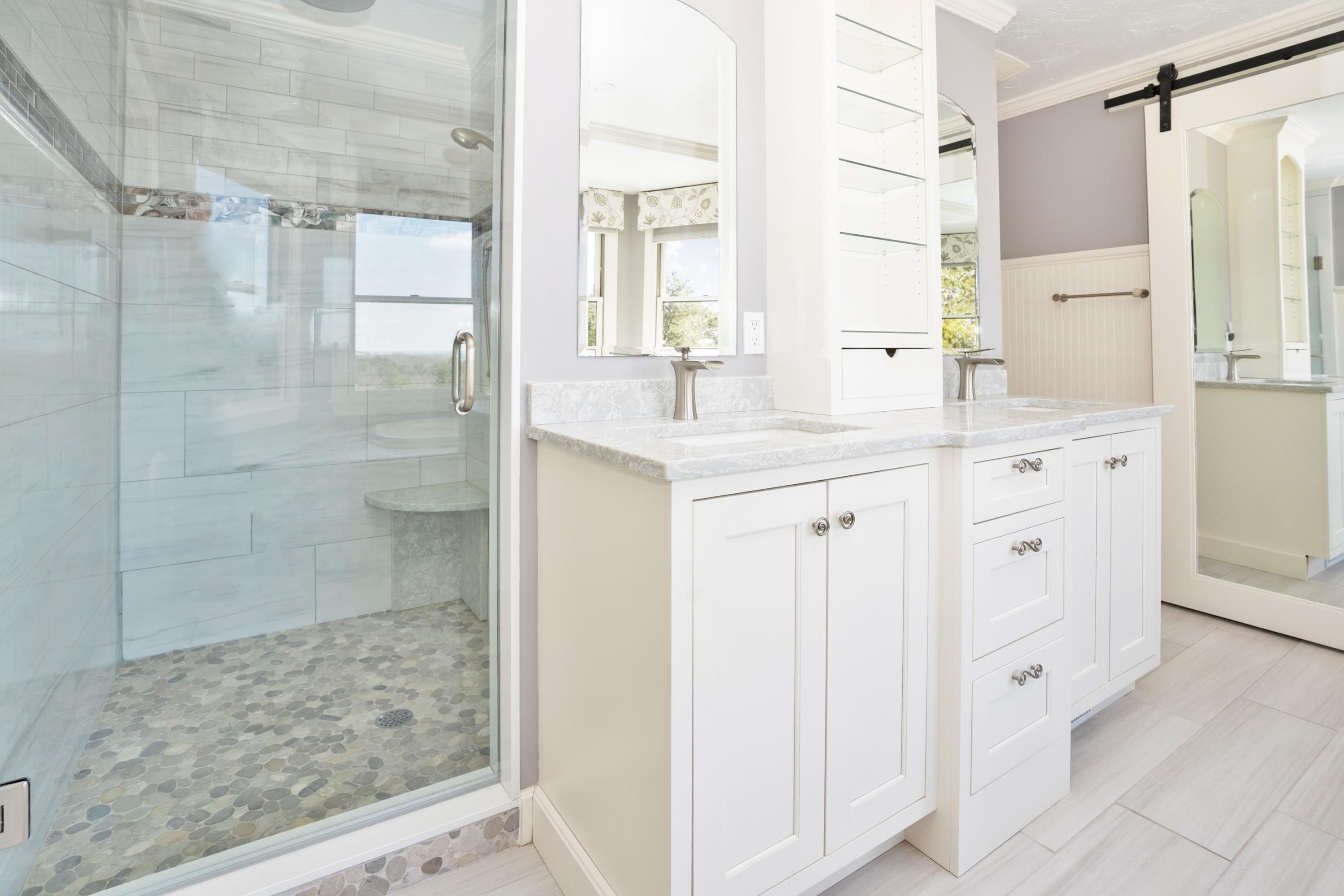 50 Major Doane Road Wellfleet, MA 02667 - Photo 33 of 91 a bathroom with a granite countertop sink mirror and shower
