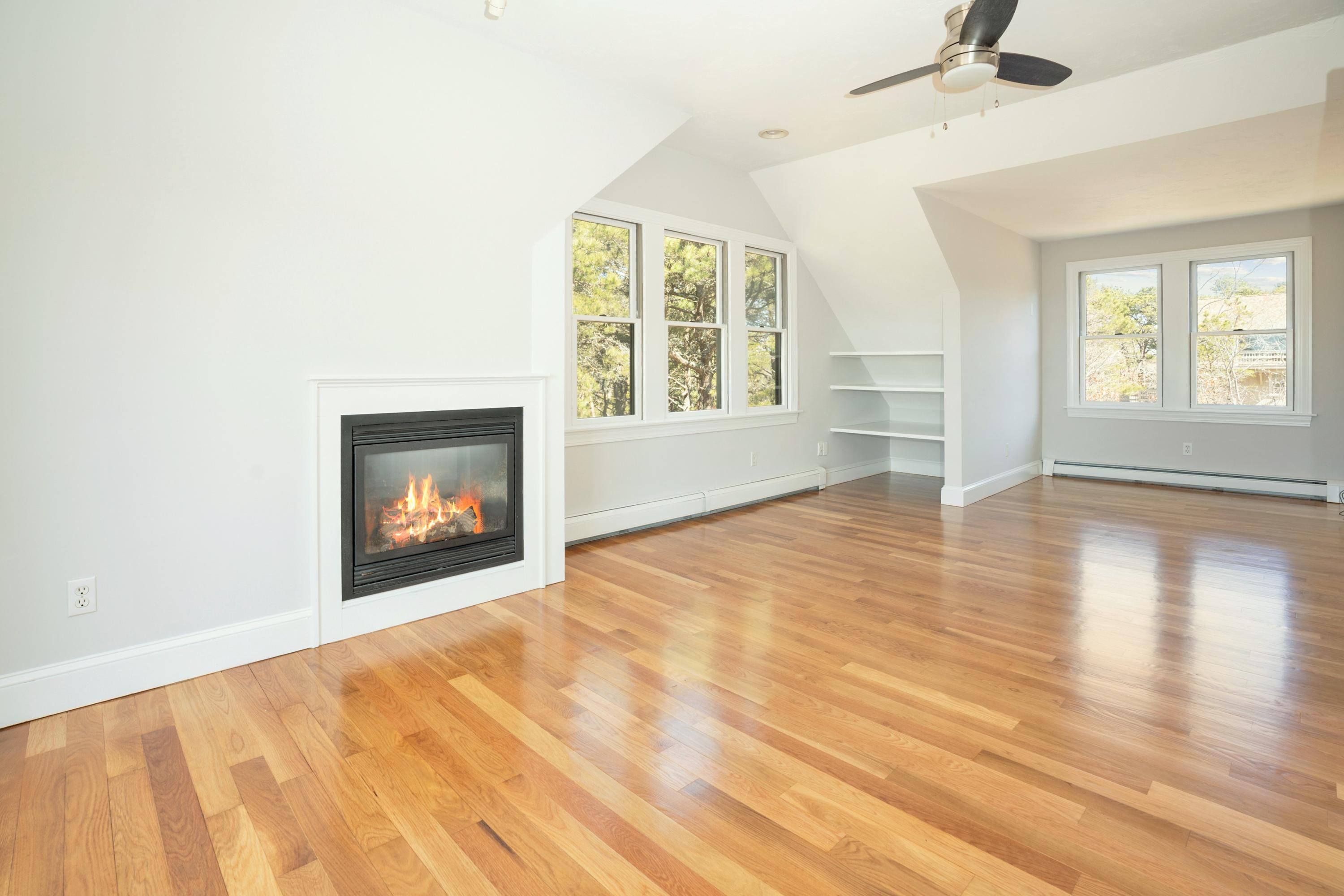 50 Major Doane Road Wellfleet, MA 02667 - Photo 39 of 91 a view of an empty room with wooden floor and a window