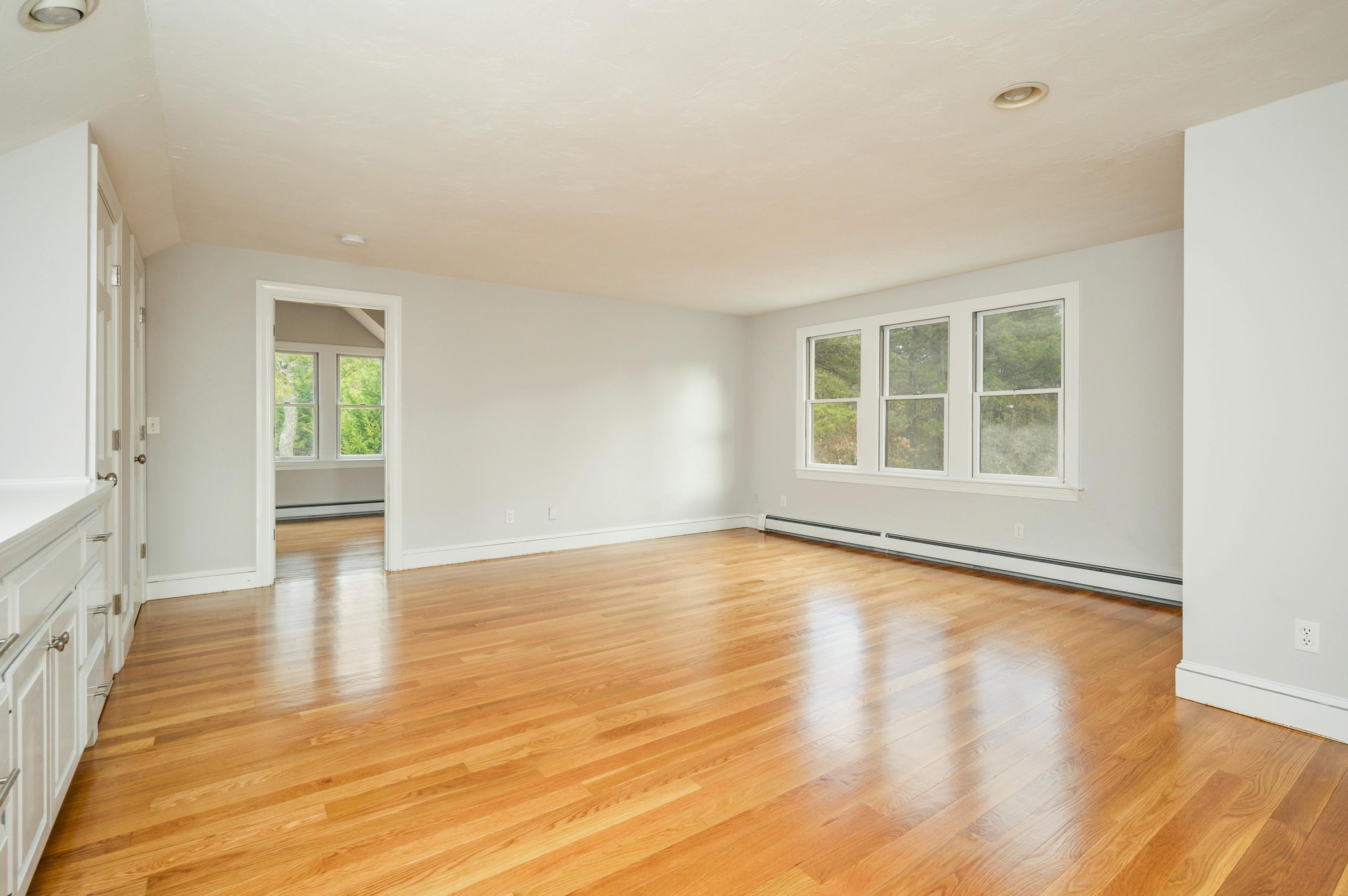 50 Major Doane Road Wellfleet, MA 02667 - Photo 43 of 91 a view of empty room with wooden floor and fan