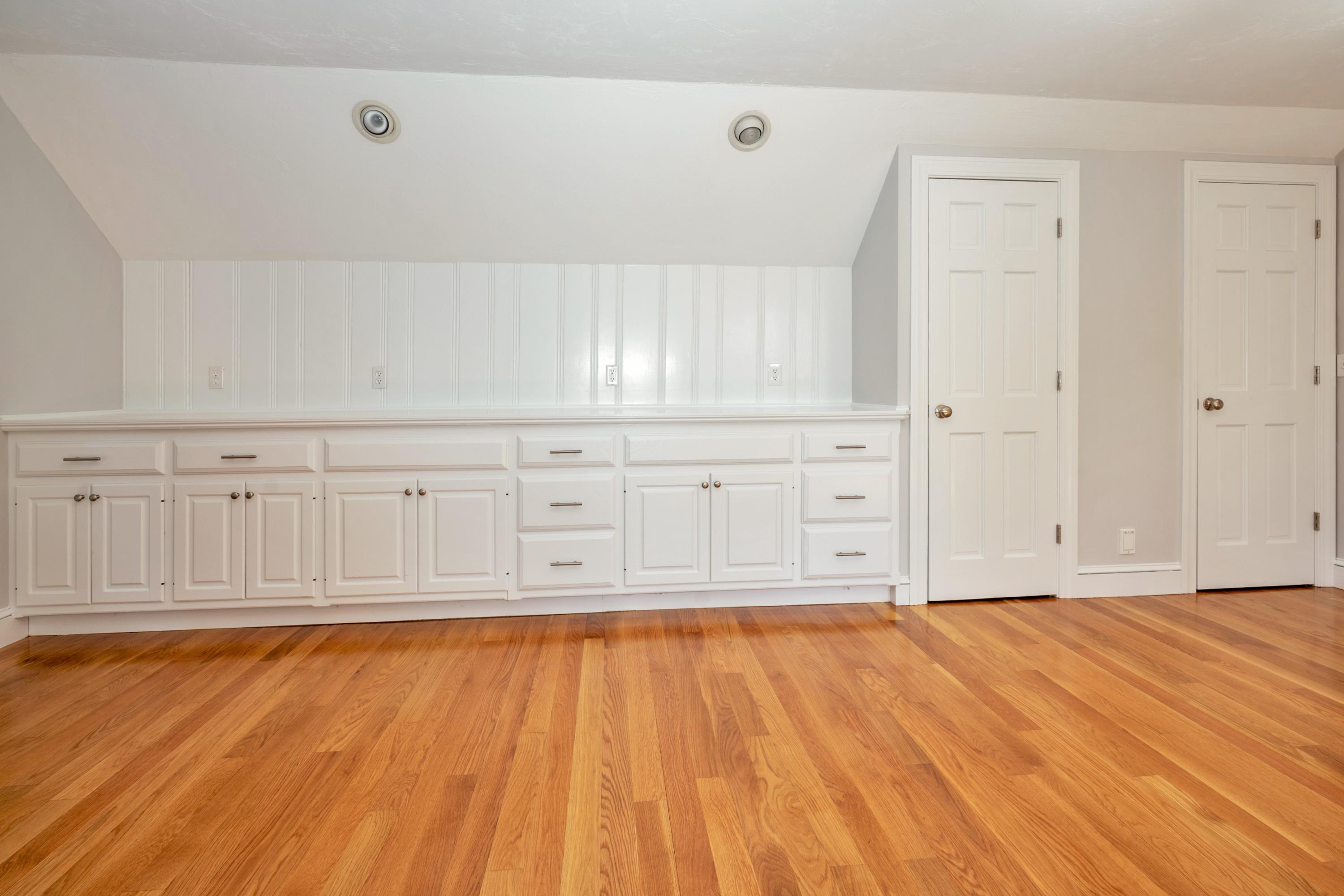 50 Major Doane Road Wellfleet, MA 02667 - Photo 47 of 91 a view of a livingroom with an empty space and wooden floor