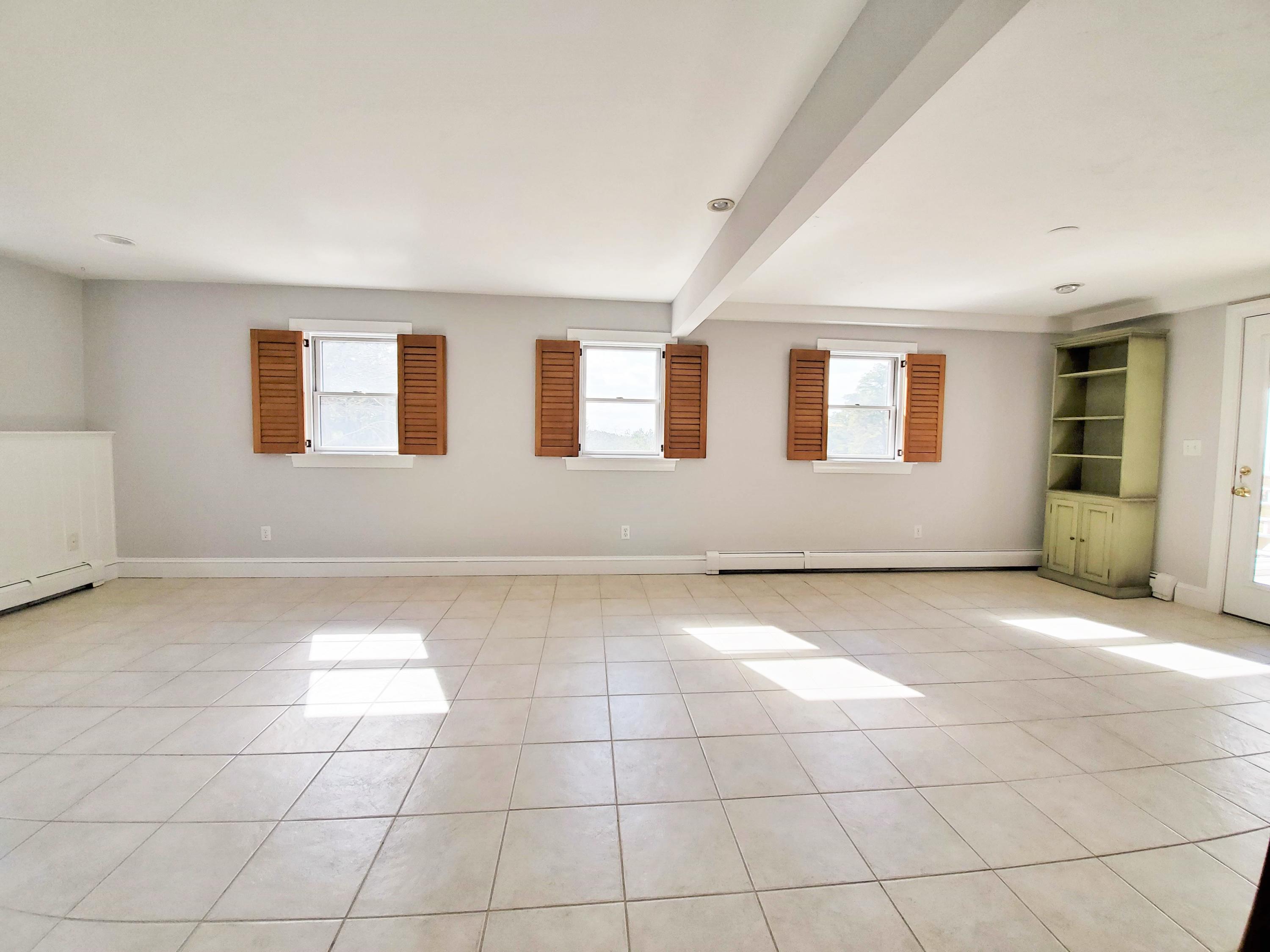 50 Major Doane Road Wellfleet, MA 02667 - Photo 53 of 91 a view of an empty room with a window