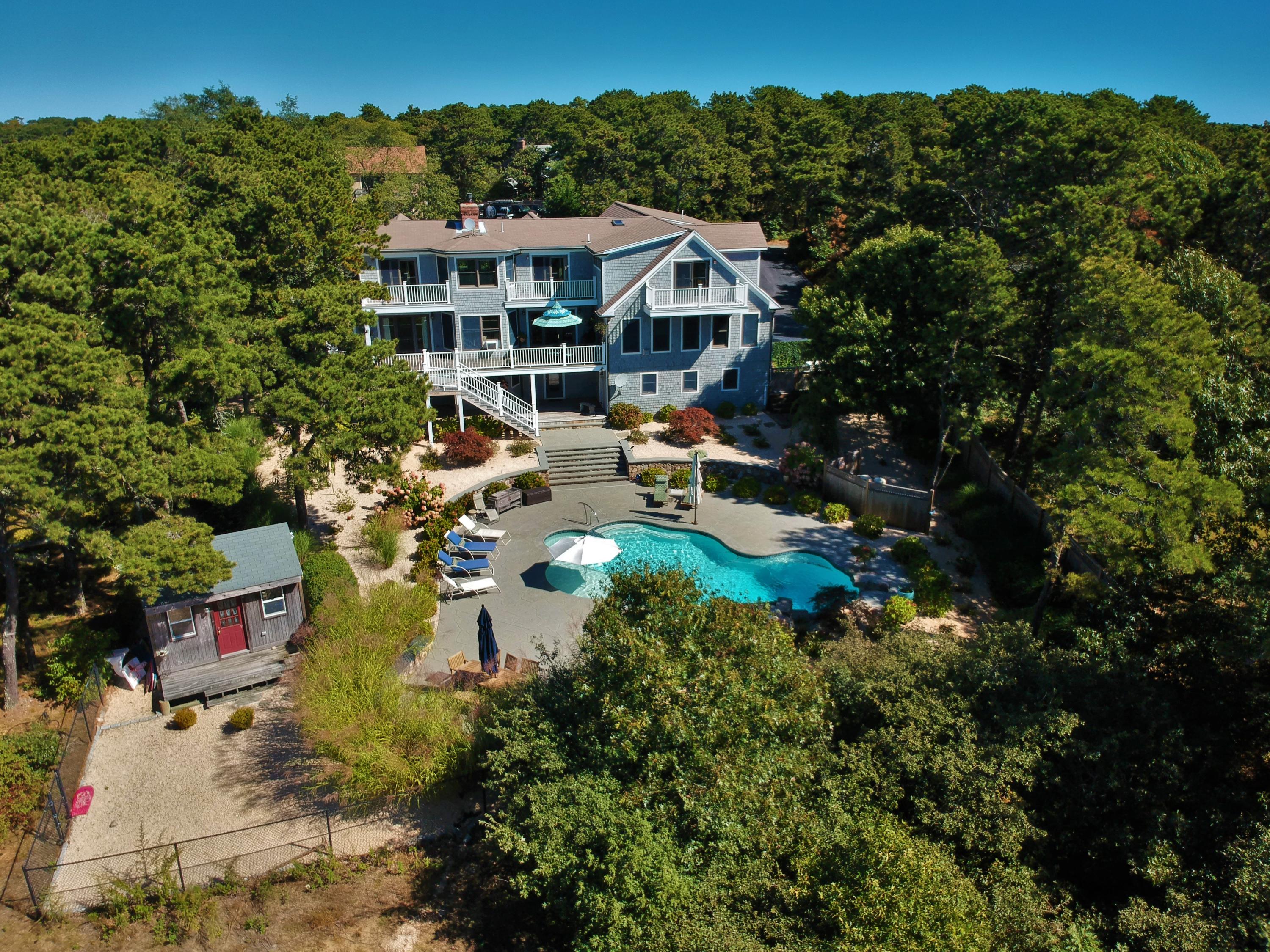 50 Major Doane Road Wellfleet, MA 02667 - Photo 64 of 91 an aerial view of a house with yard swimming pool and outdoor seating