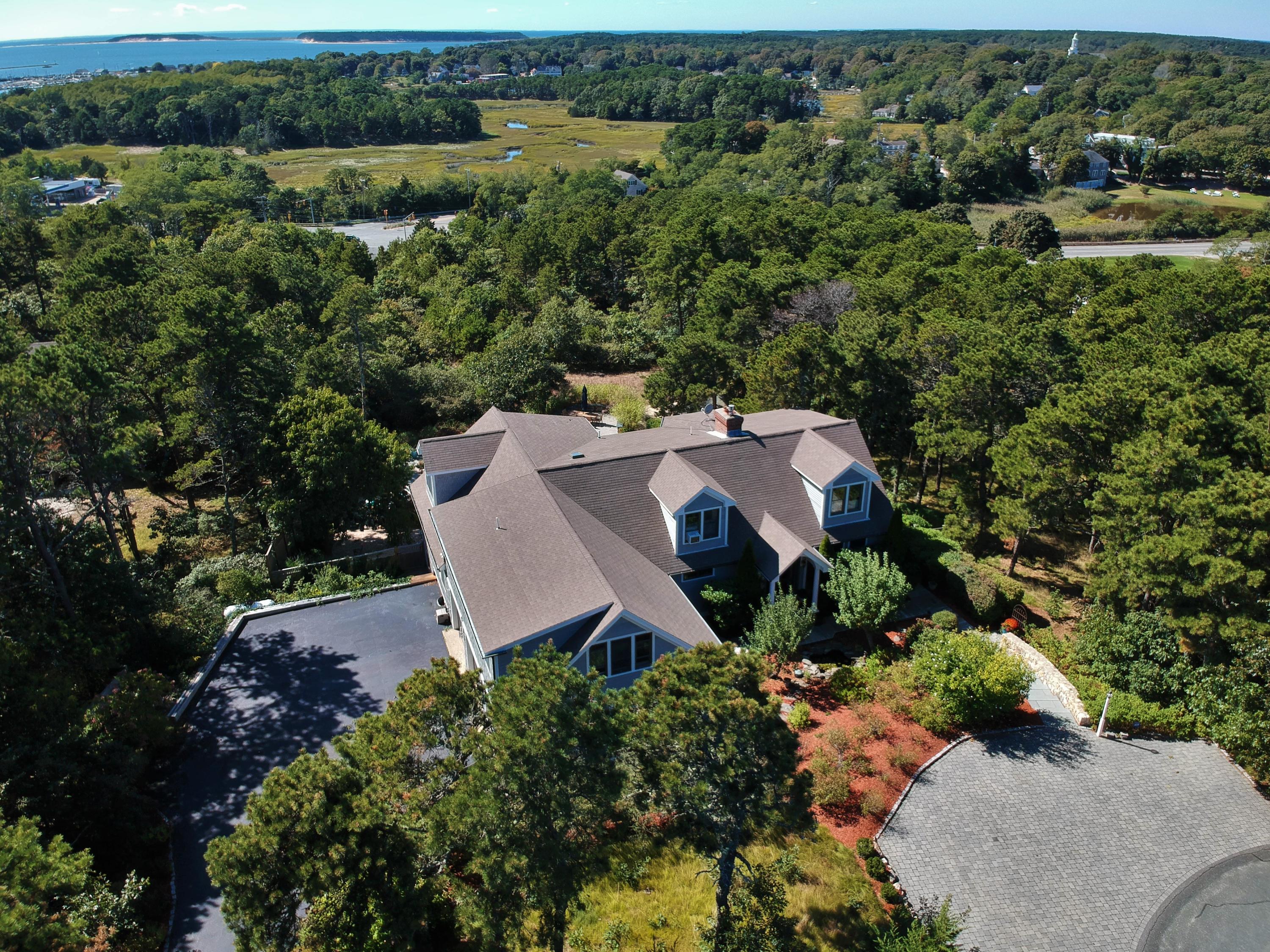 50 Major Doane Road Wellfleet, MA 02667 - Photo 66 of 91 an aerial view of a house with a yard