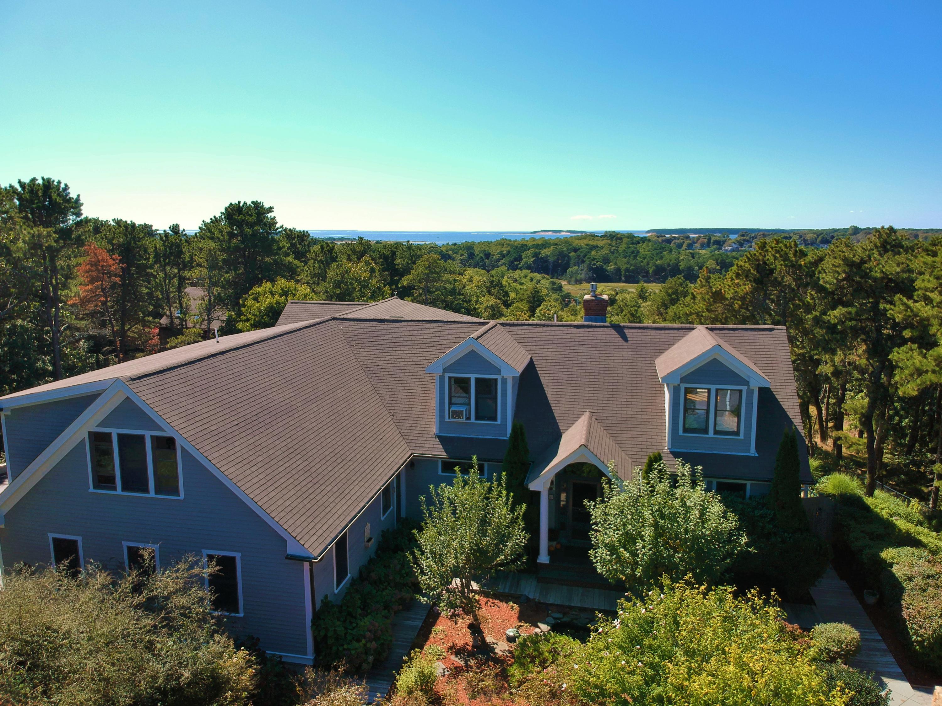 50 Major Doane Road Wellfleet, MA 02667 - Photo 67 of 91 an aerial view of a house with a yard