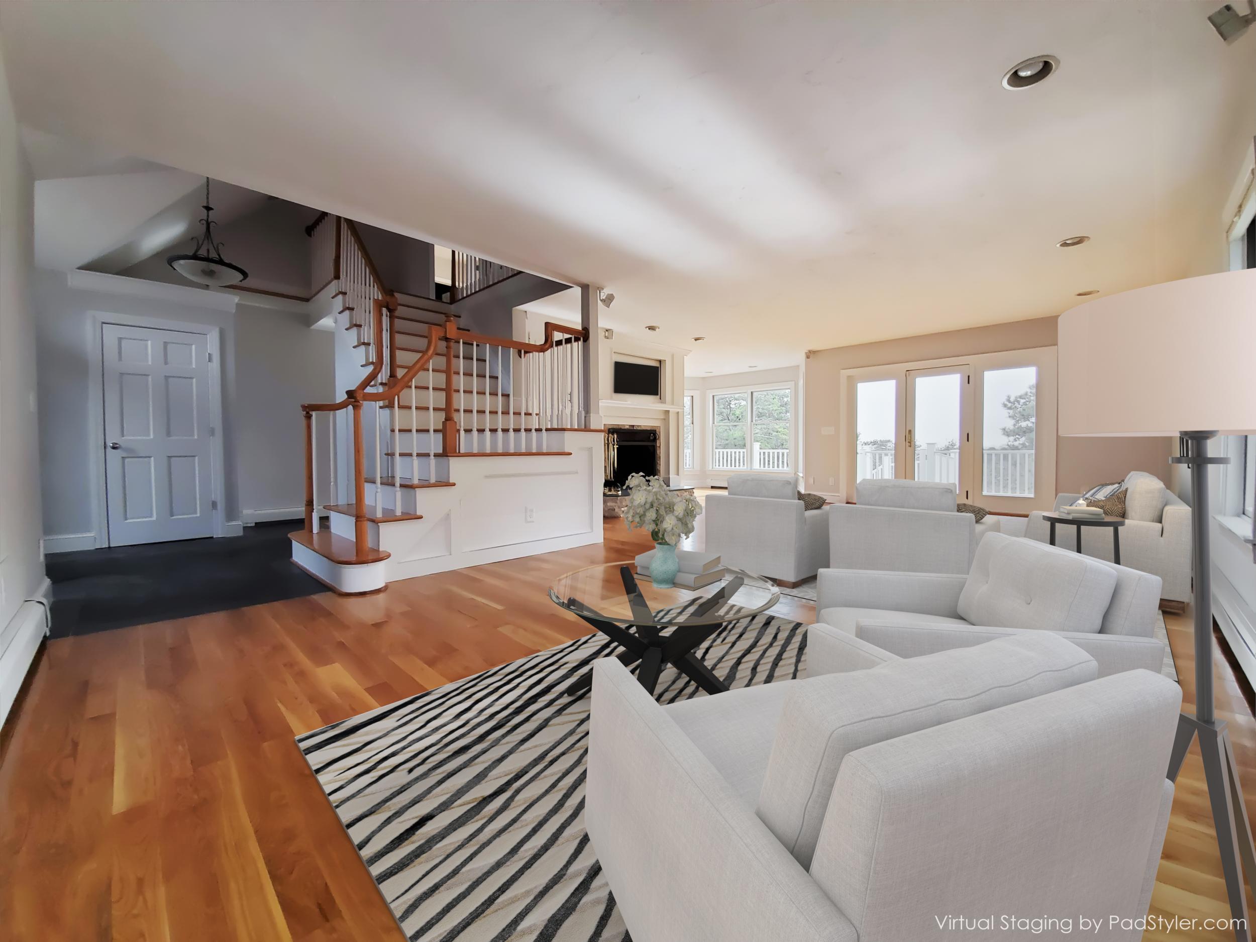 50 Major Doane Road Wellfleet, MA 02667 - Photo 9 of 91 a living room with furniture and a wooden floor