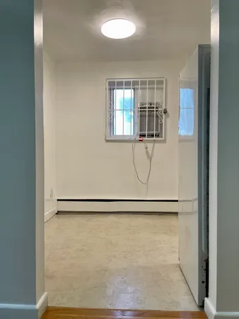 a white bath tub sitting in a bathroom