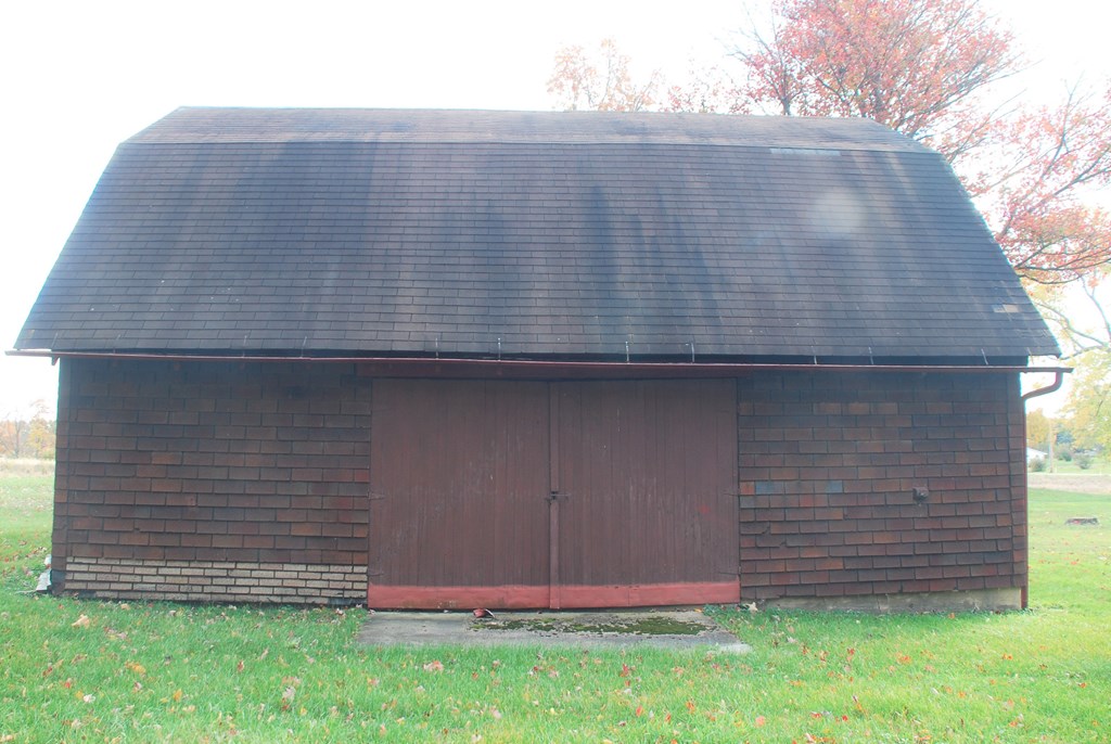 1155 Lawsonham Road Rimersburg, PA 16248 - Photo 16 of 45 a tall brick building with a yard