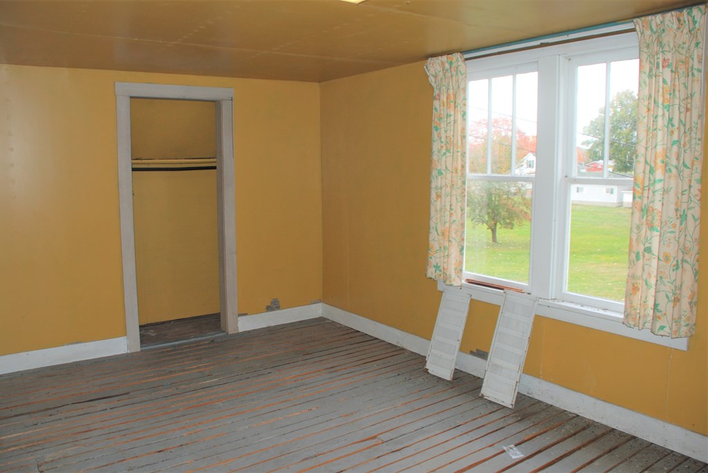 1155 Lawsonham Road Rimersburg, PA 16248 - Photo 39 of 45 a view of an empty room with wooden floor and a window