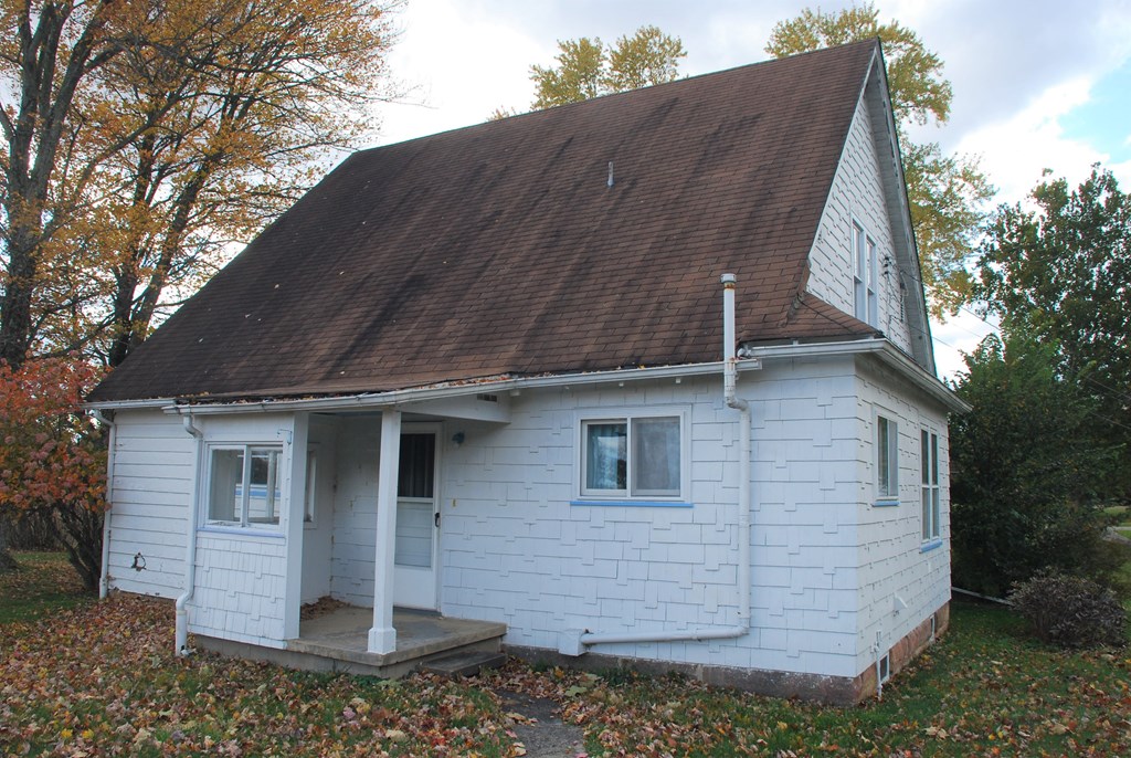 1155 Lawsonham Road Rimersburg, PA 16248 - Photo 7 of 45 a view of a stone house with large windows