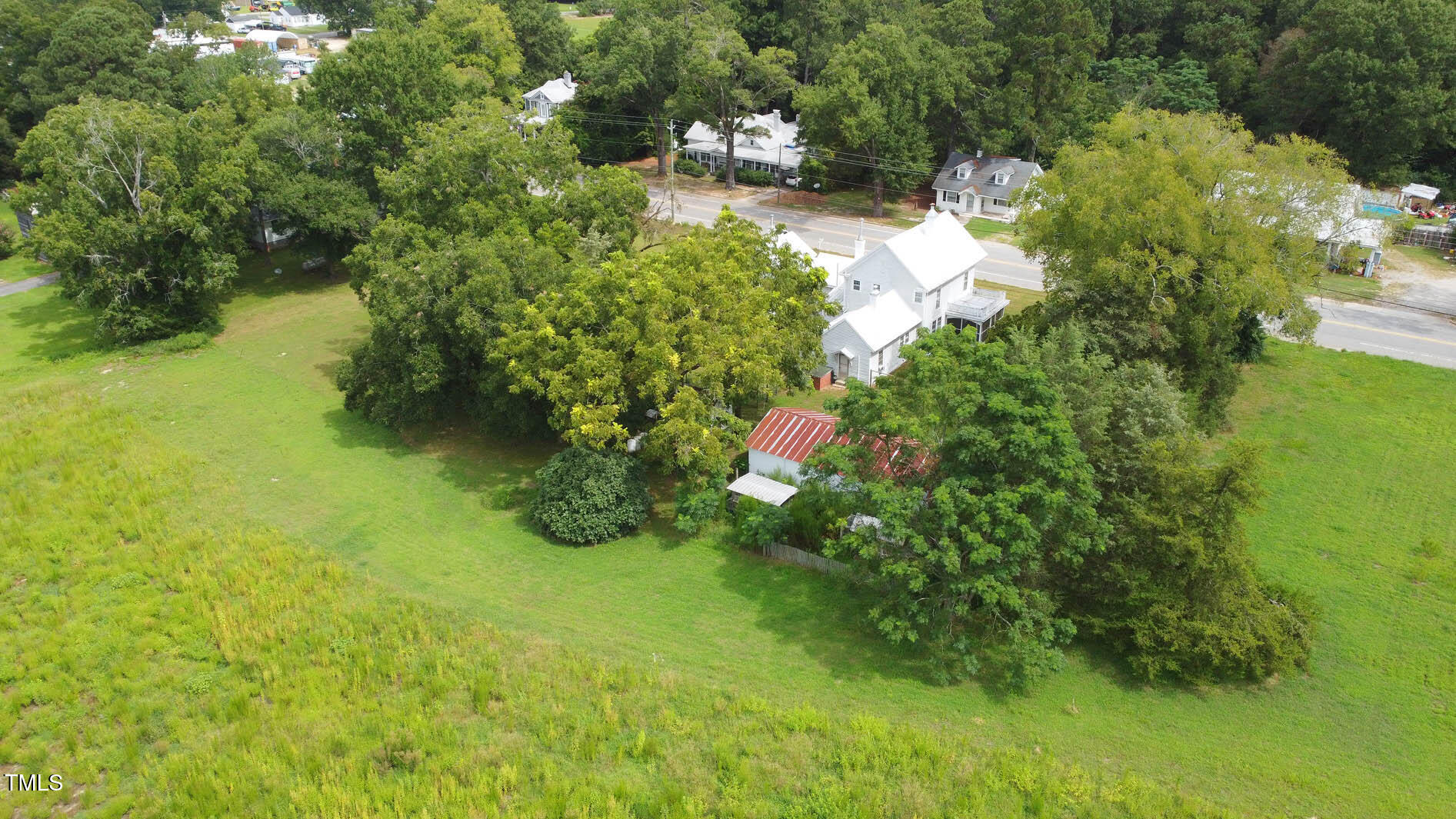 9358 Main Street Castalia, NC 27816 - Photo 17 of 92 a lush green forest with lots of trees