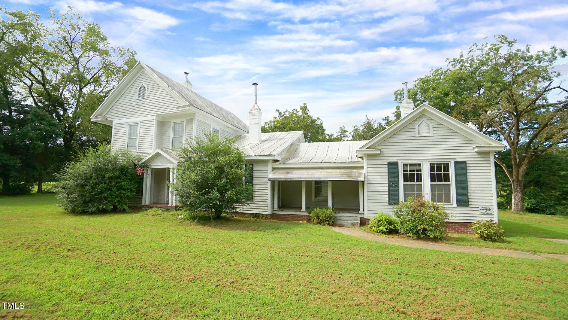 9358 Main Street Castalia, NC 27816 - Photo 22 of 92 a front view of house with yard and green space