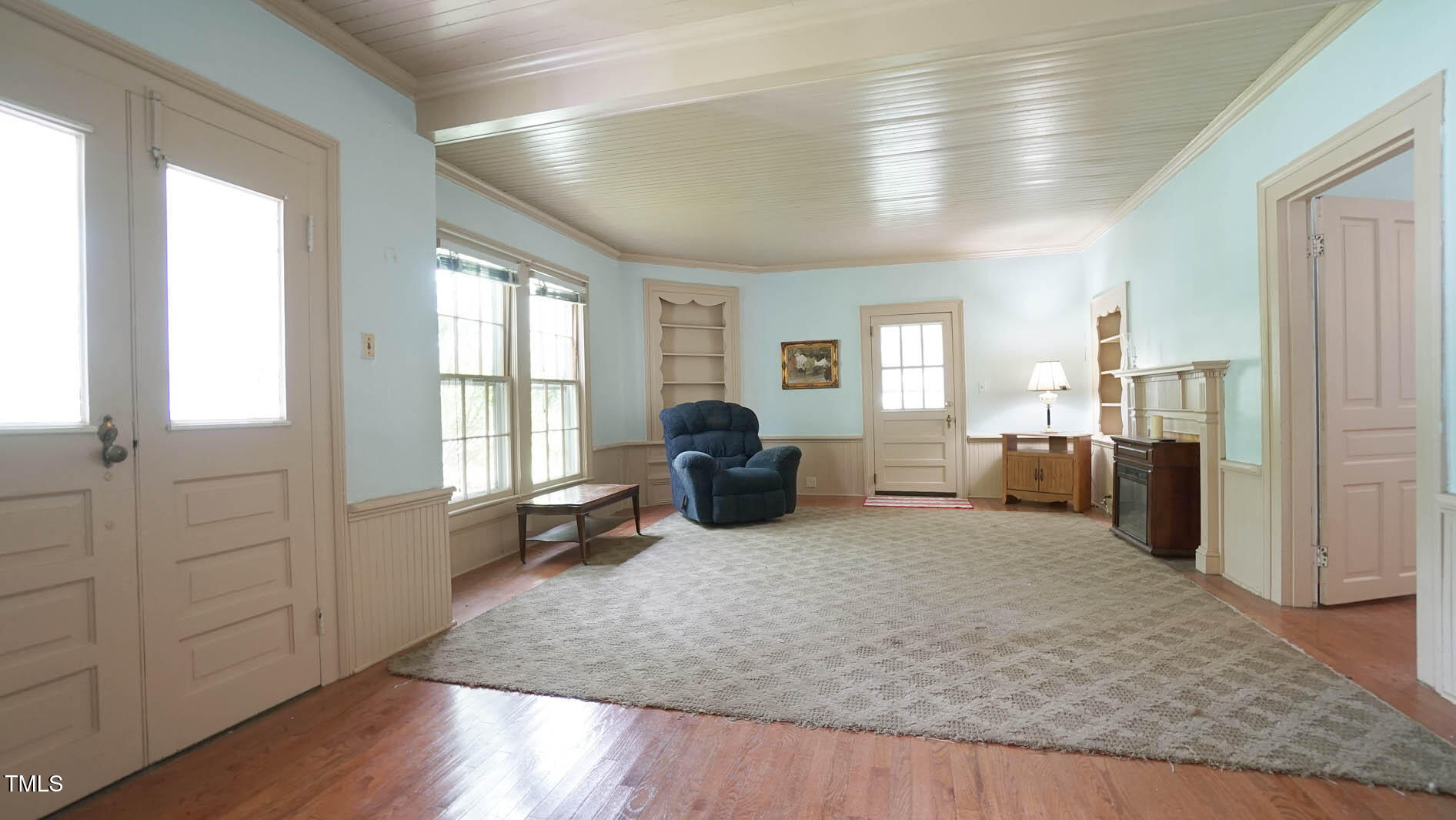 9358 Main Street Castalia, NC 27816 - Photo 30 of 92 a living room with furniture window and wooden floor