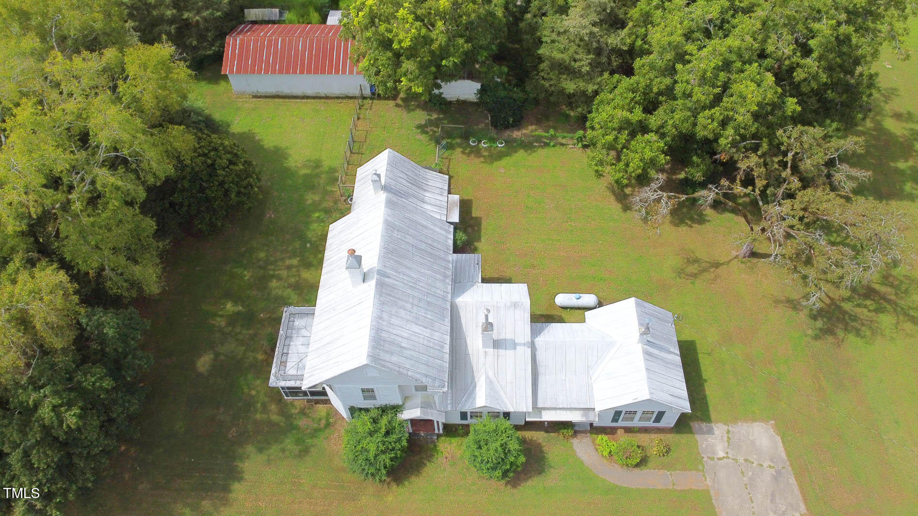 9358 Main Street Castalia, NC 27816 - Photo 4 of 92 an aerial view of a house with a yard basket ball court and outdoor seating