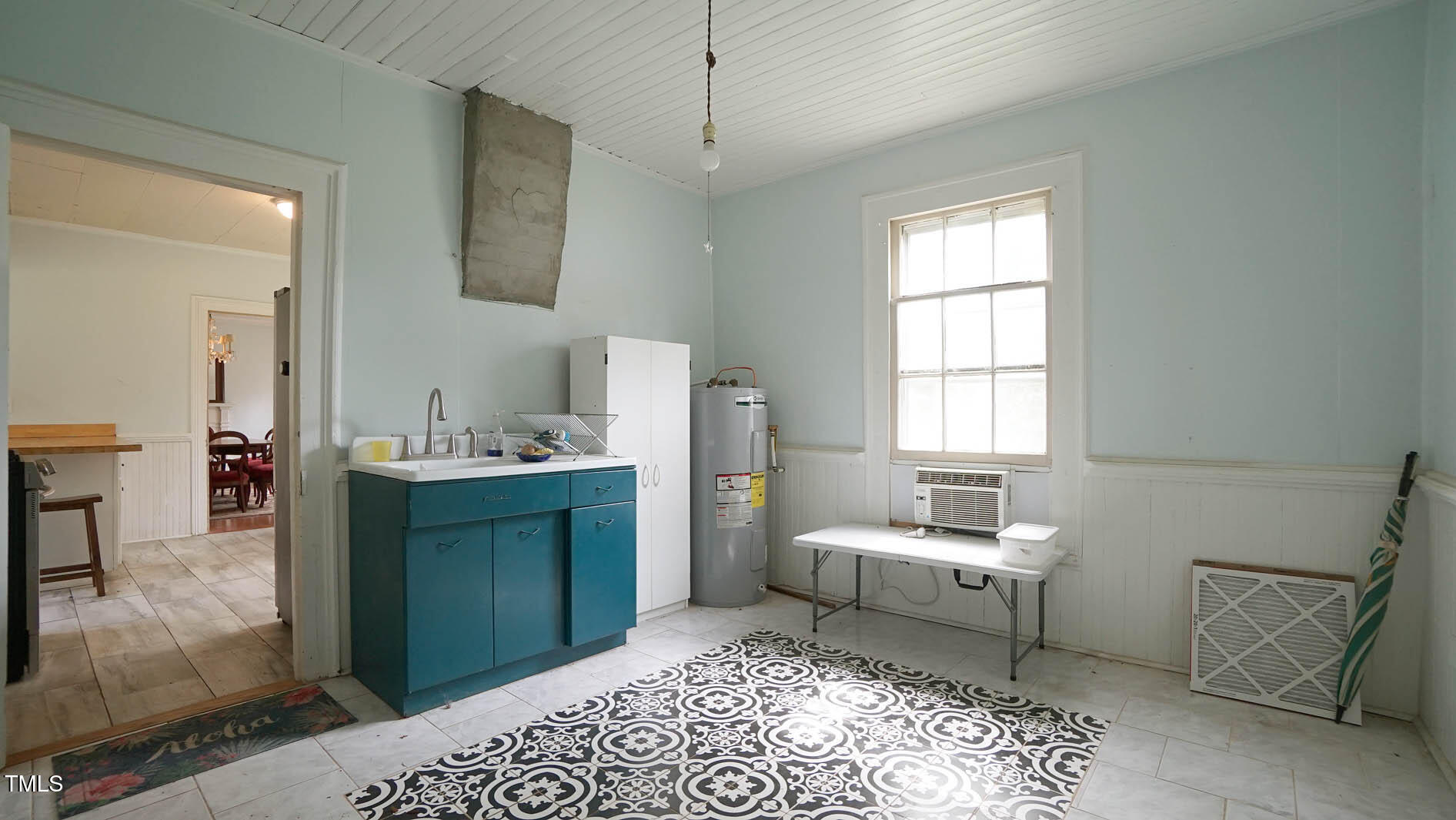 9358 Main Street Castalia, NC 27816 - Photo 47 of 92 a en suite bathroom with a sink and a mirror
