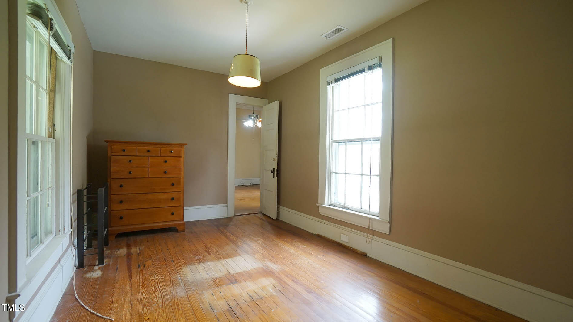 9358 Main Street Castalia, NC 27816 - Photo 62 of 92 wooden floor in an empty room with a window