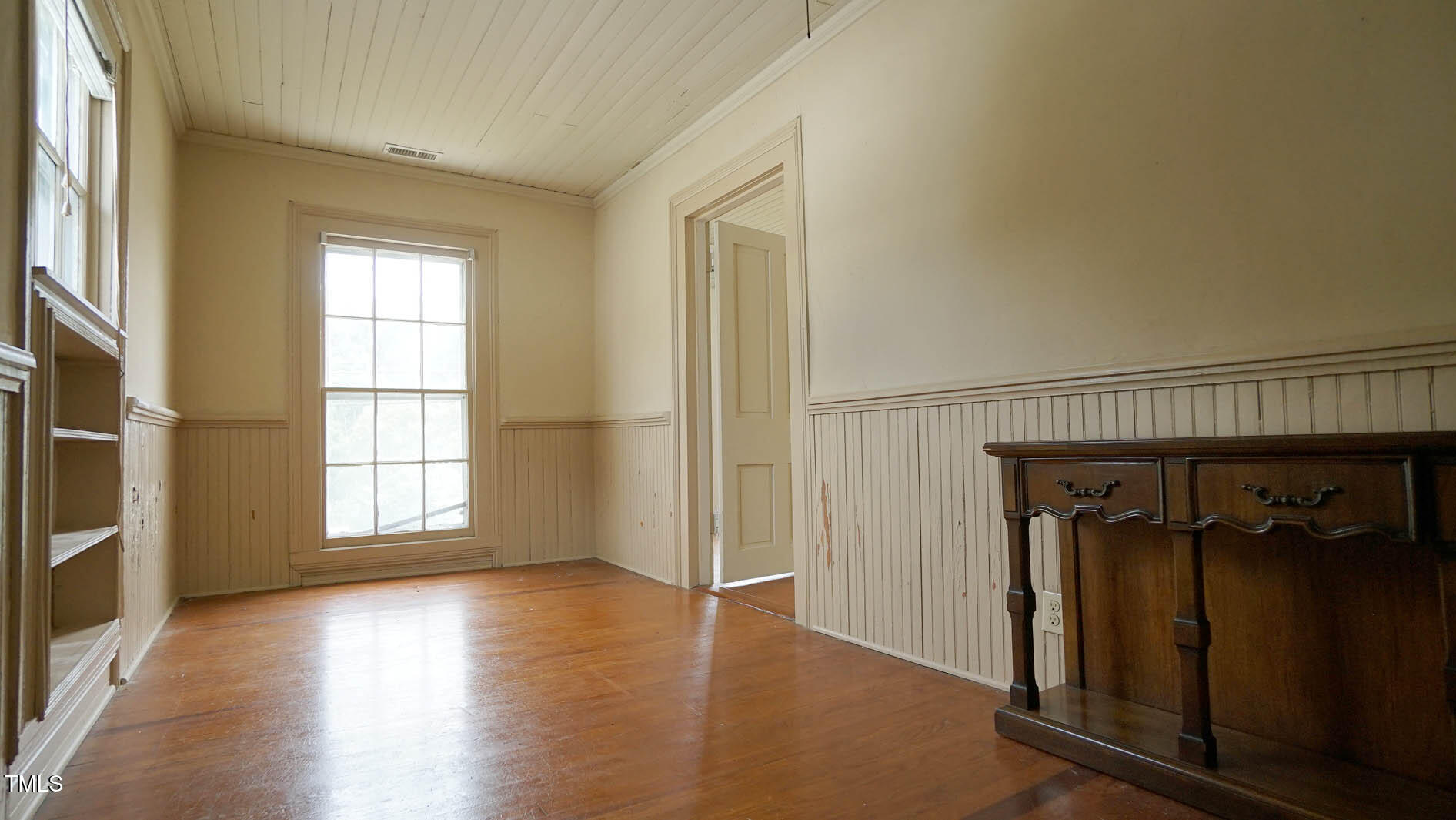 9358 Main Street Castalia, NC 27816 - Photo 67 of 92 an empty room with wooden floor closet and windows