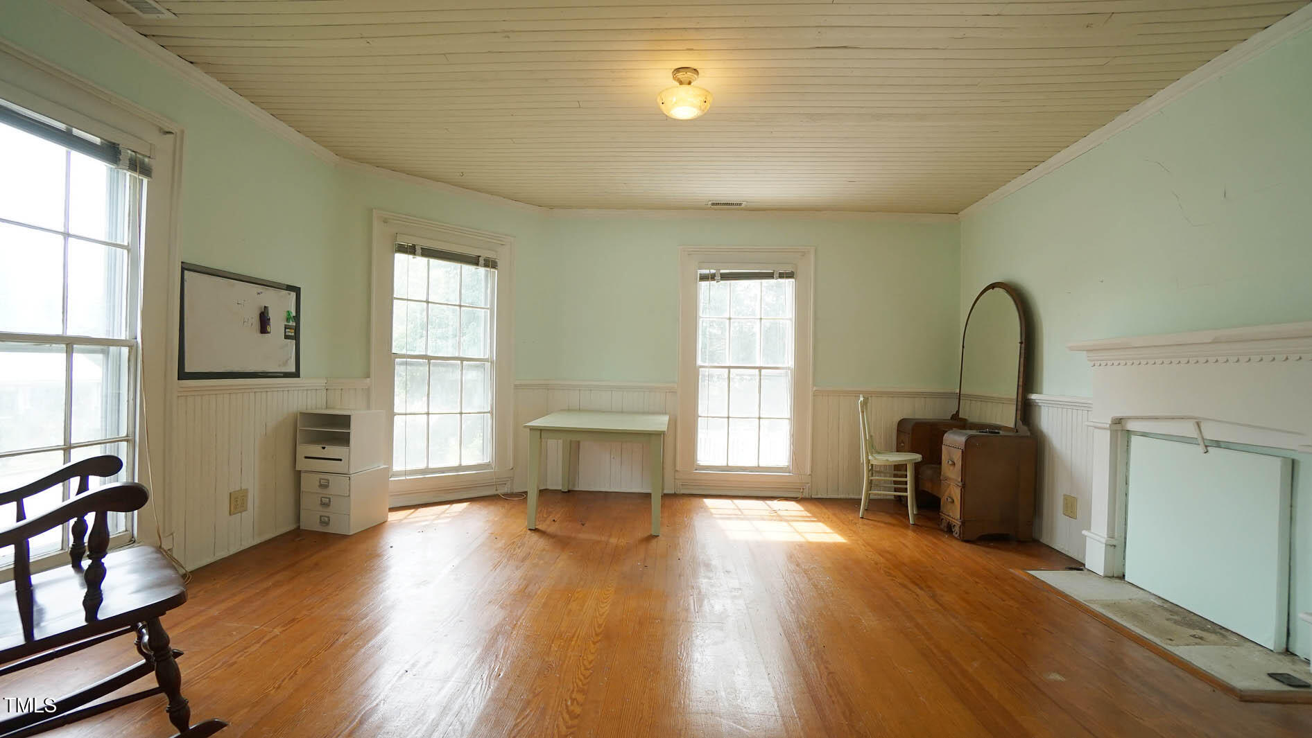 9358 Main Street Castalia, NC 27816 - Photo 69 of 92 wooden floor in an empty room with a window