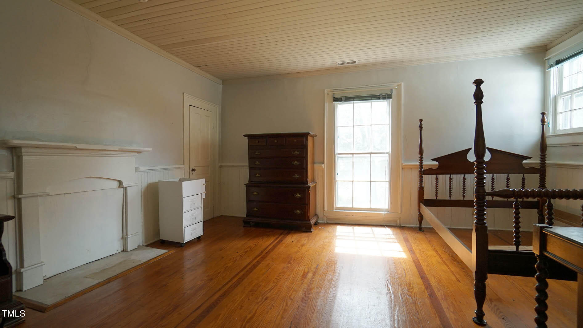 9358 Main Street Castalia, NC 27816 - Photo 76 of 92 a view of empty room with a window and wooden floor