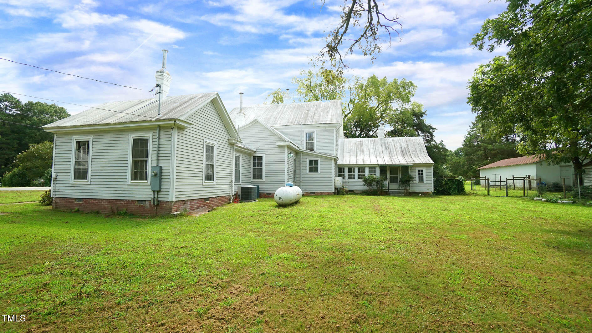 9358 Main Street Castalia, NC 27816 - Photo 83 of 92 a view of a house with a backyard