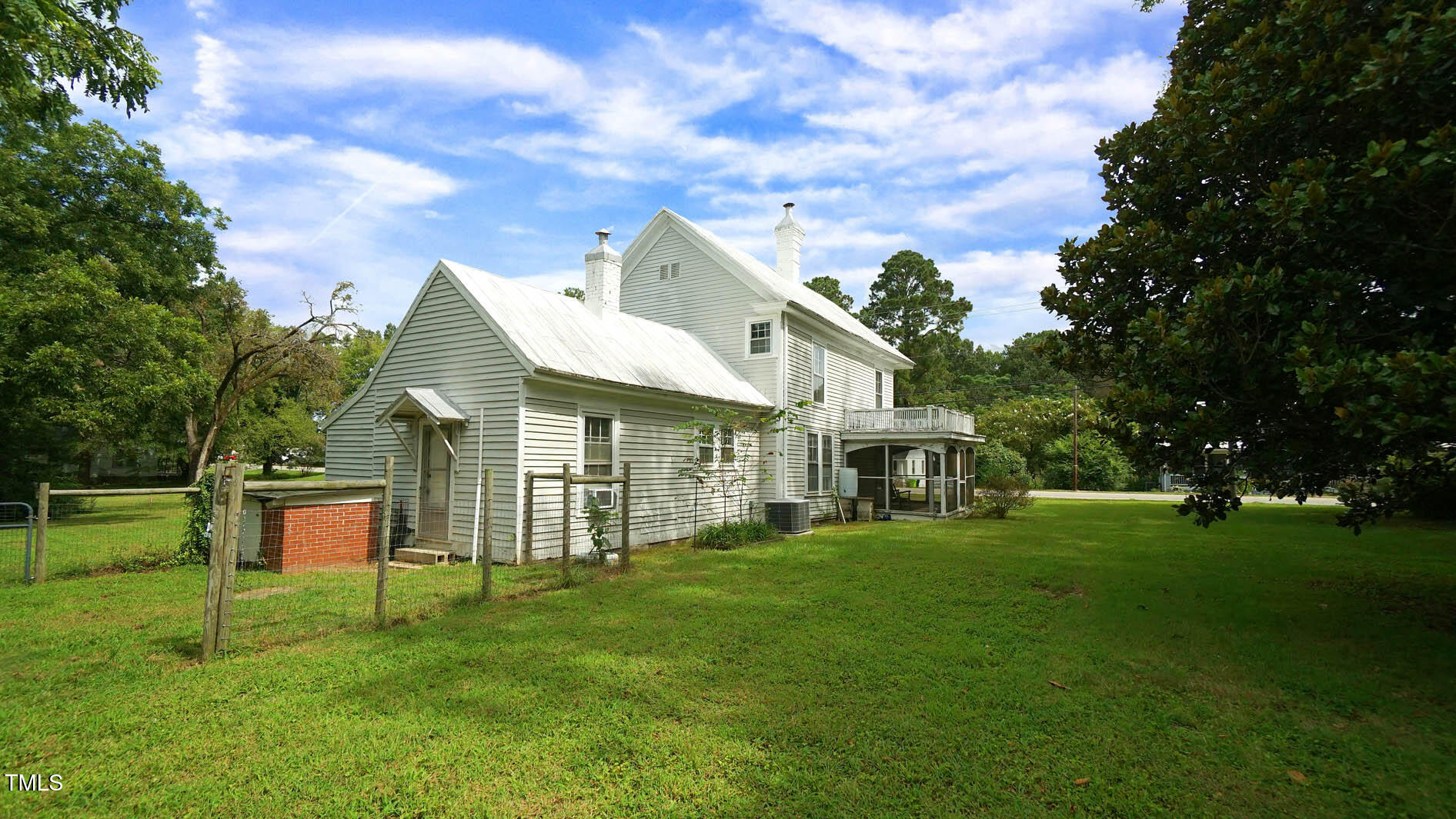 9358 Main Street Castalia, NC 27816 - Photo 87 of 92 a front view of a house with a garden