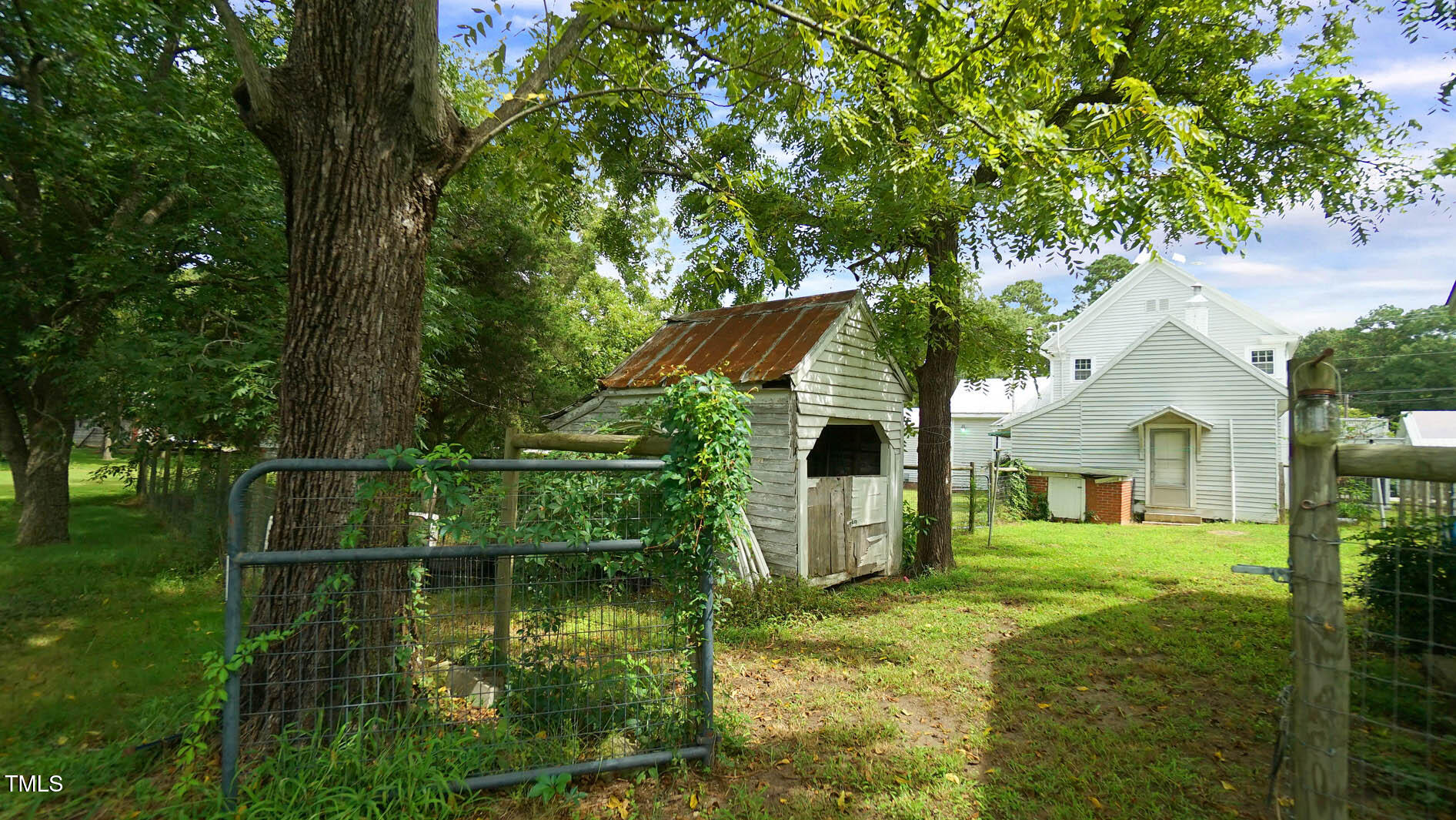 9358 Main Street Castalia, NC 27816 - Photo 89 of 92 a view of house with a yard