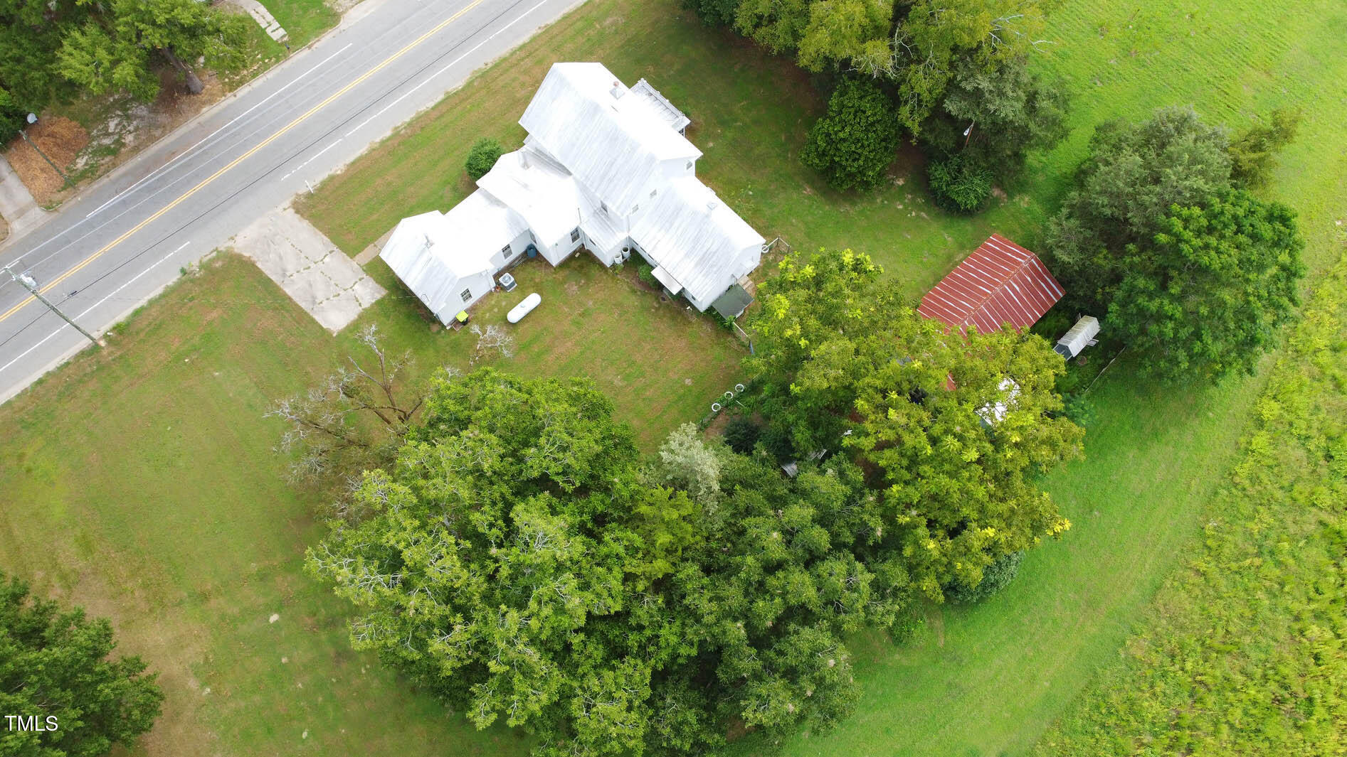 9358 Main Street Castalia, NC 27816 - Photo 9 of 92 a close up of a flower in a garden