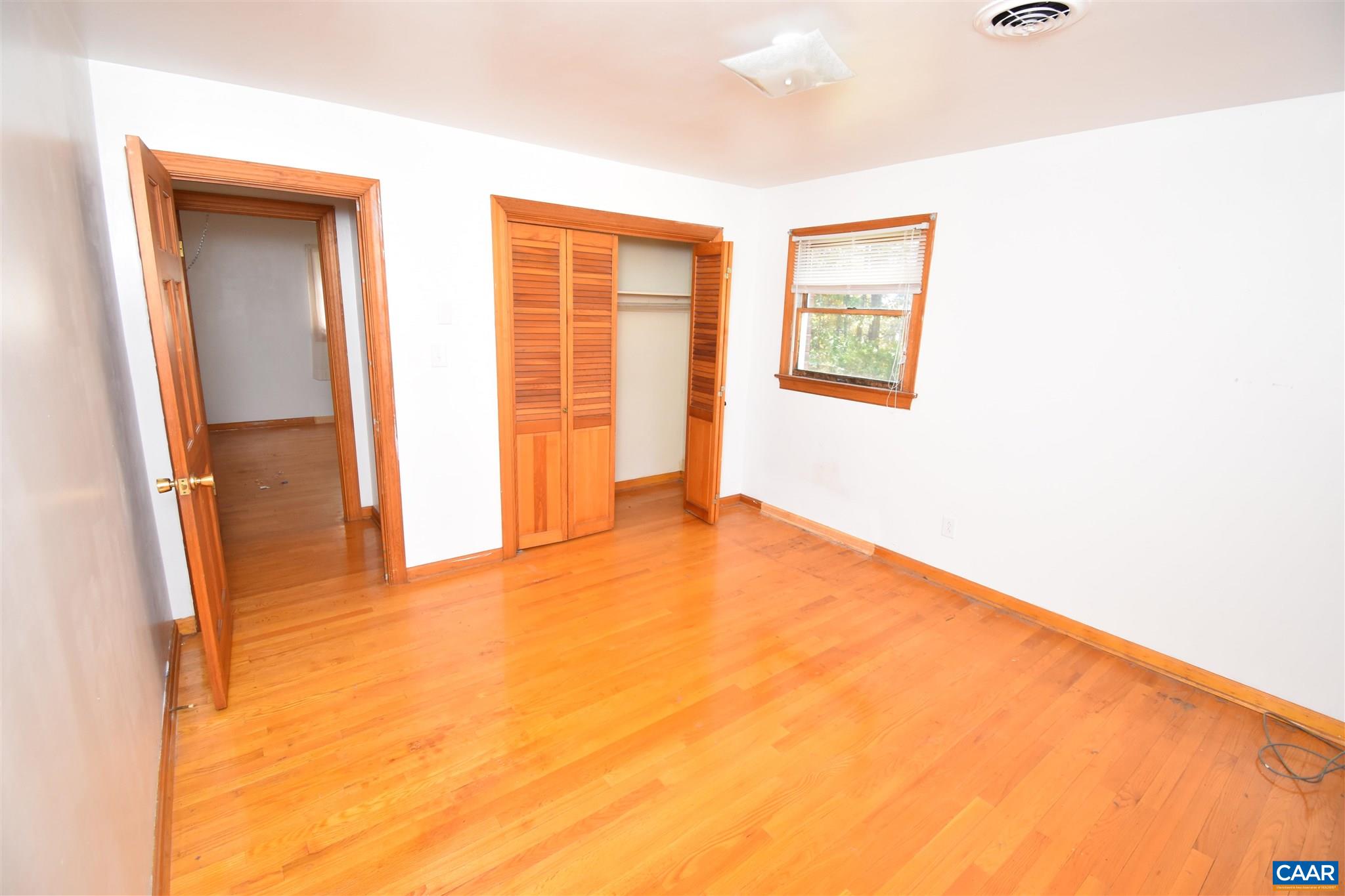 26 Warmar Road Ruckersville, VA 22968 - Photo 16 of 30 a view of an empty room with wooden floor
