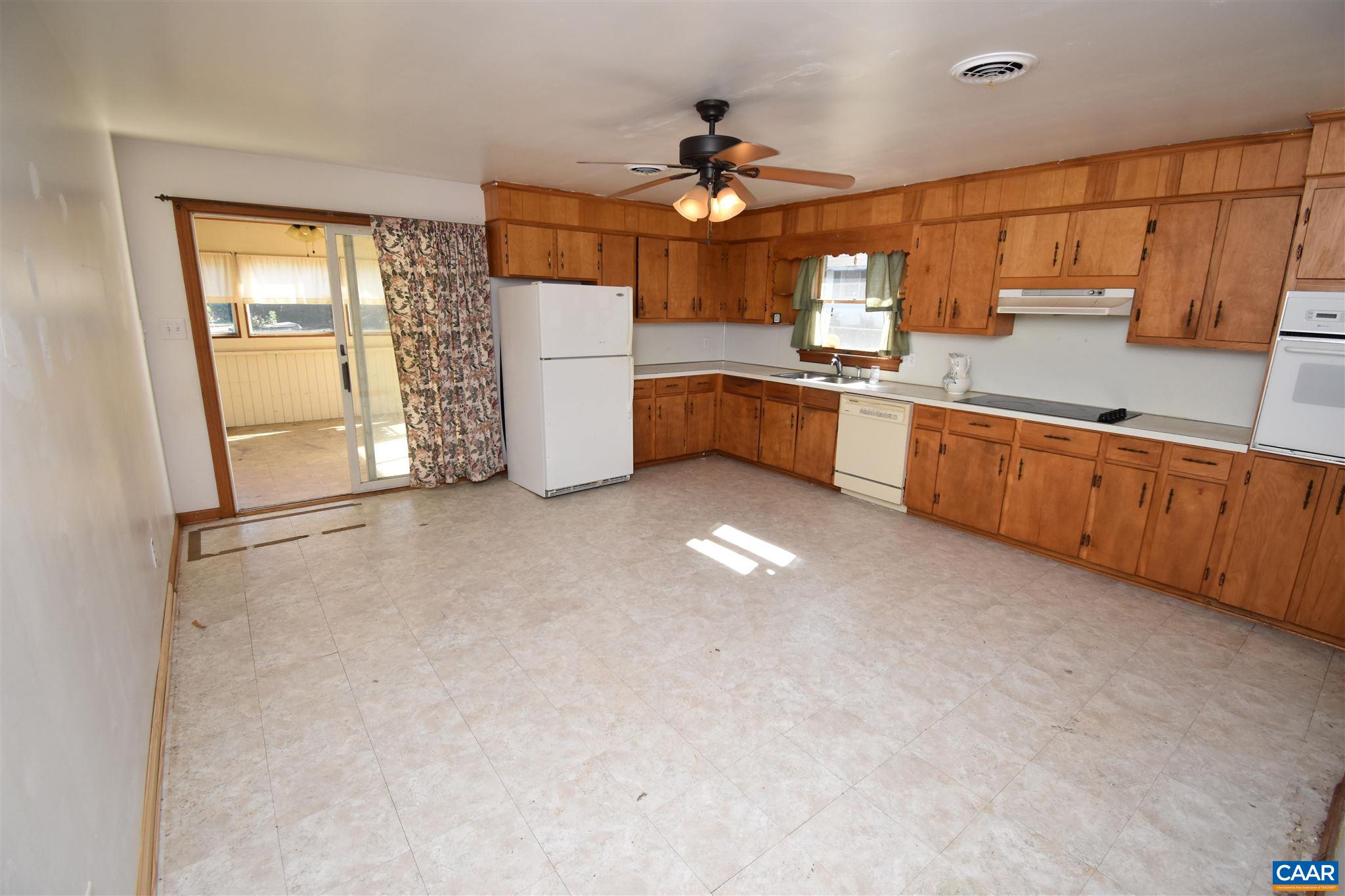 26 Warmar Road Ruckersville, VA 22968 - Photo 10 of 30 a large kitchen with cabinets and stainless steel appliances