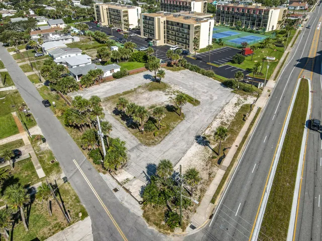 a view of a swimming pool with a yard