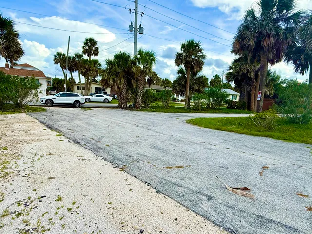 a view of a garden with swimming pool