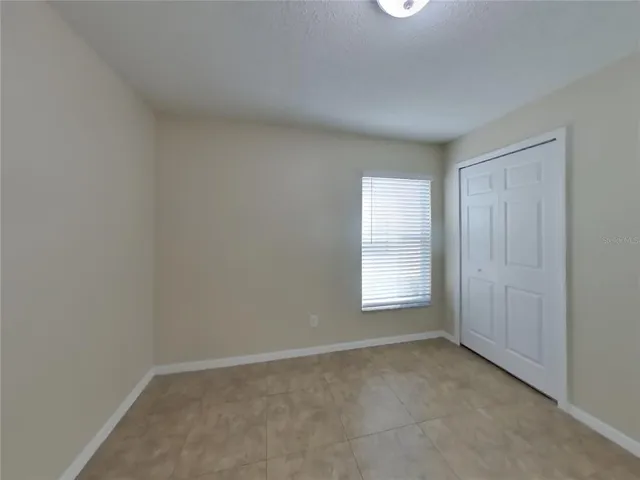 wooden floor and window in a room