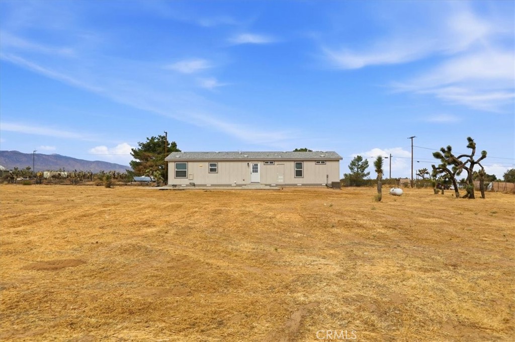 11251 Nevada Road Phelan, CA 92371 - Photo 5 of 28 Right side of home