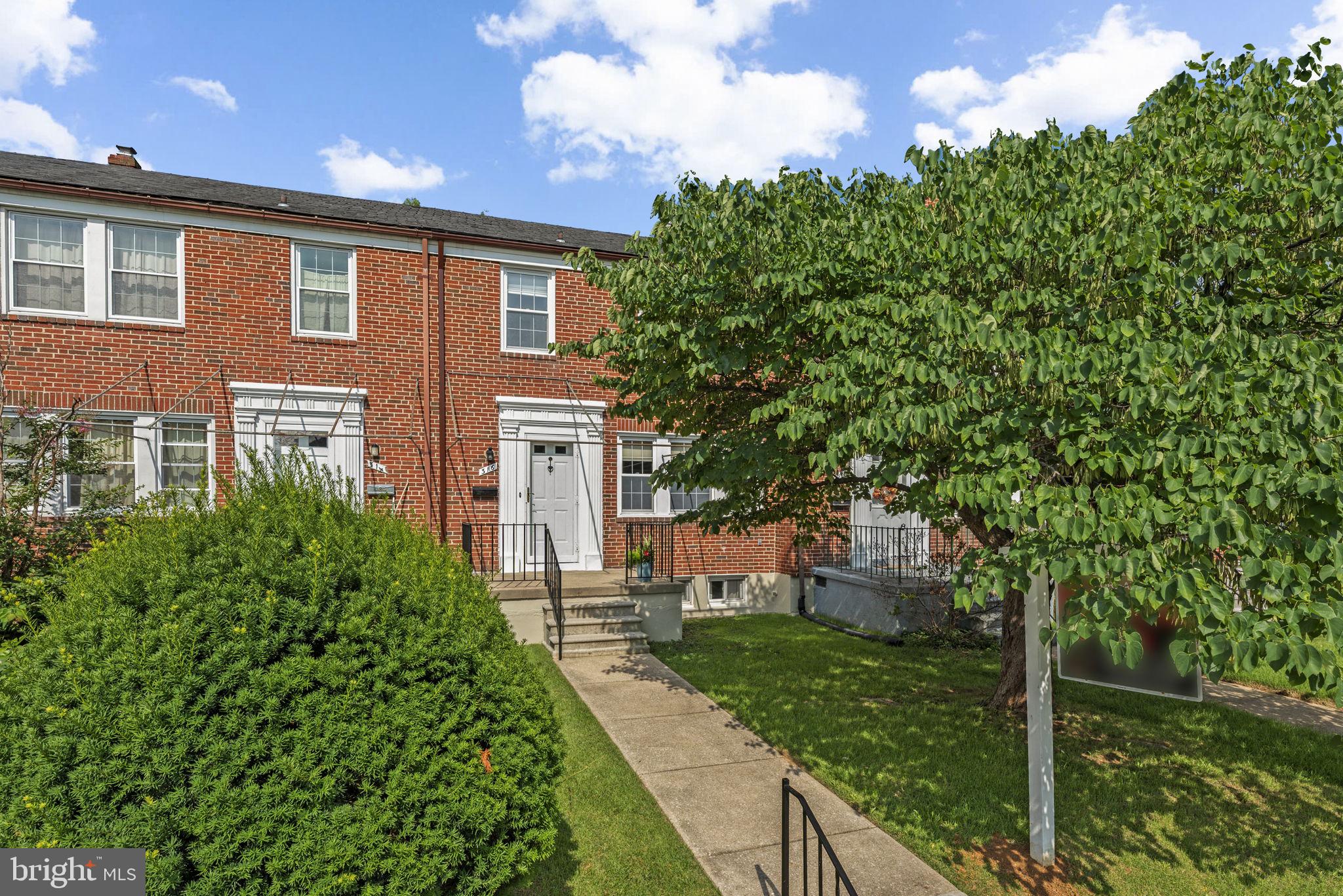 316 Whitfield Road Baltimore, MD 21228 - Photo 2 of 30 a front view of a house with a yard