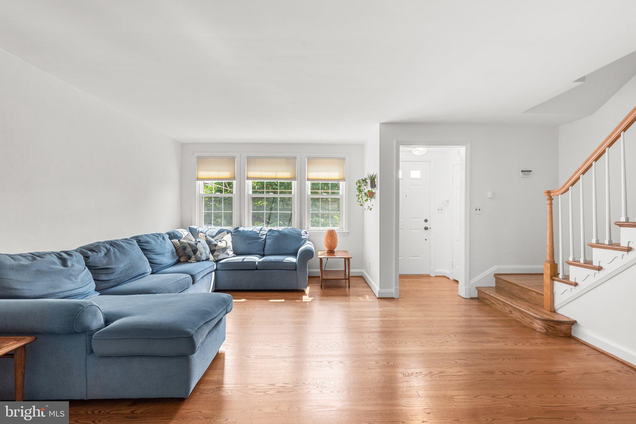 316 Whitfield Road Baltimore, MD 21228 - Photo 5 of 30 a living room with furniture and a large window