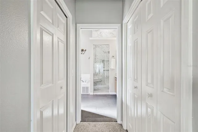 a view of a bathroom with a glass door