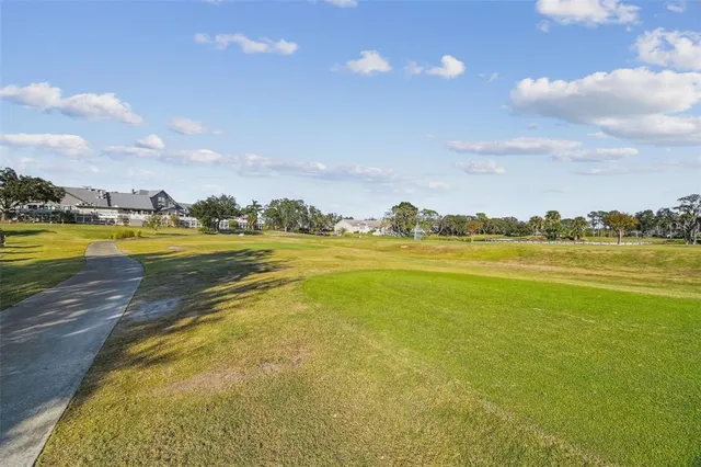 a view of a house with a swimming pool